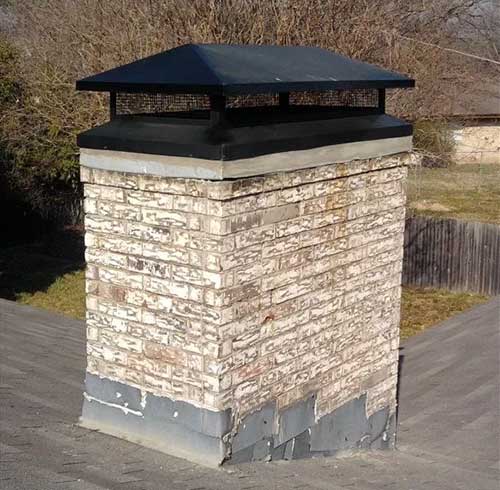 Stock photo -new hip and ridge chimney crown-Blue Velvet Chimney New hip and ridge chimney crown to keep out rain, leaves and animals