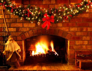 fireplace decorated for the holidays