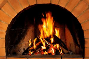 roaring fire in a fireplace