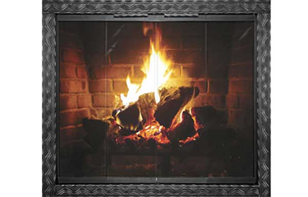 Thermo-Rite glass door on fireplace firebox that has a black facing and a nice roaring fire